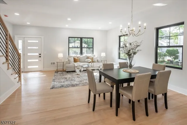 a kitchen with a sink cabinets and window