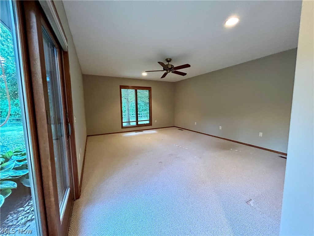 8763 Timber Edge Drive North Ridgeville, OH 44039 - Photo 16 of 40 Carpeted empty room featuring ceiling fan