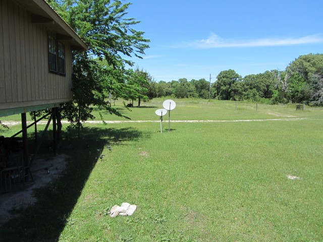 313 Jenkins Road Huntsville, TX 77320 - Photo 18 of 33 a view of yard with green space