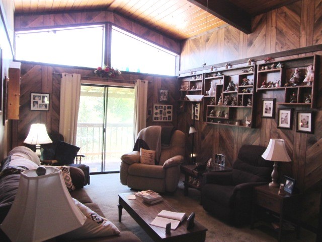 313 Jenkins Road Huntsville, TX 77320 - Photo 3 of 33 a living room with furniture and a window