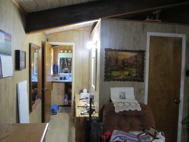 313 Jenkins Road Huntsville, TX 77320 - Photo 8 of 33 a living room with furniture and a flat screen tv