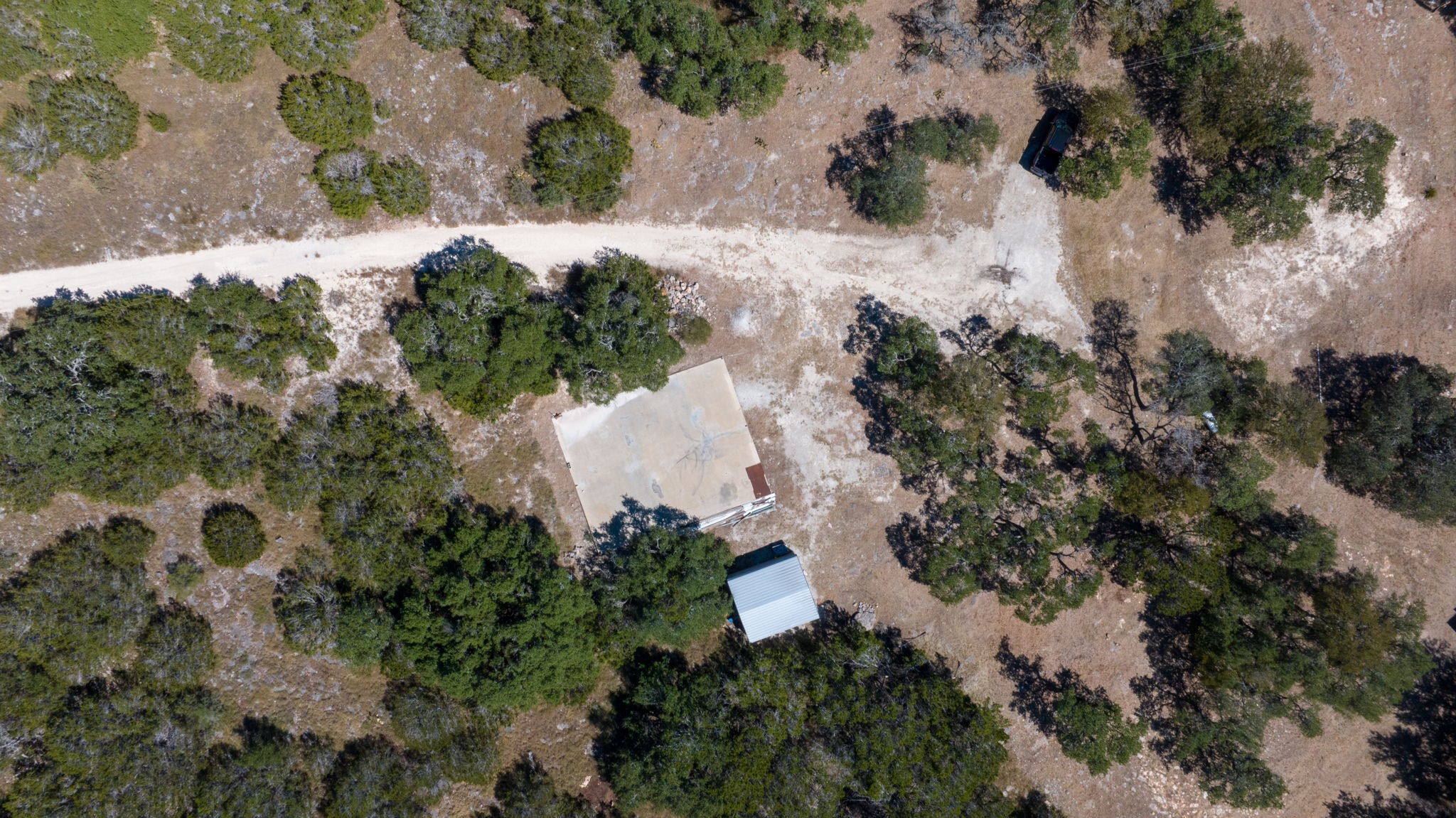 840 Forest View Drive Blanco, TX 78606 - Photo 18 of 32 an aerial view of a house with a yard