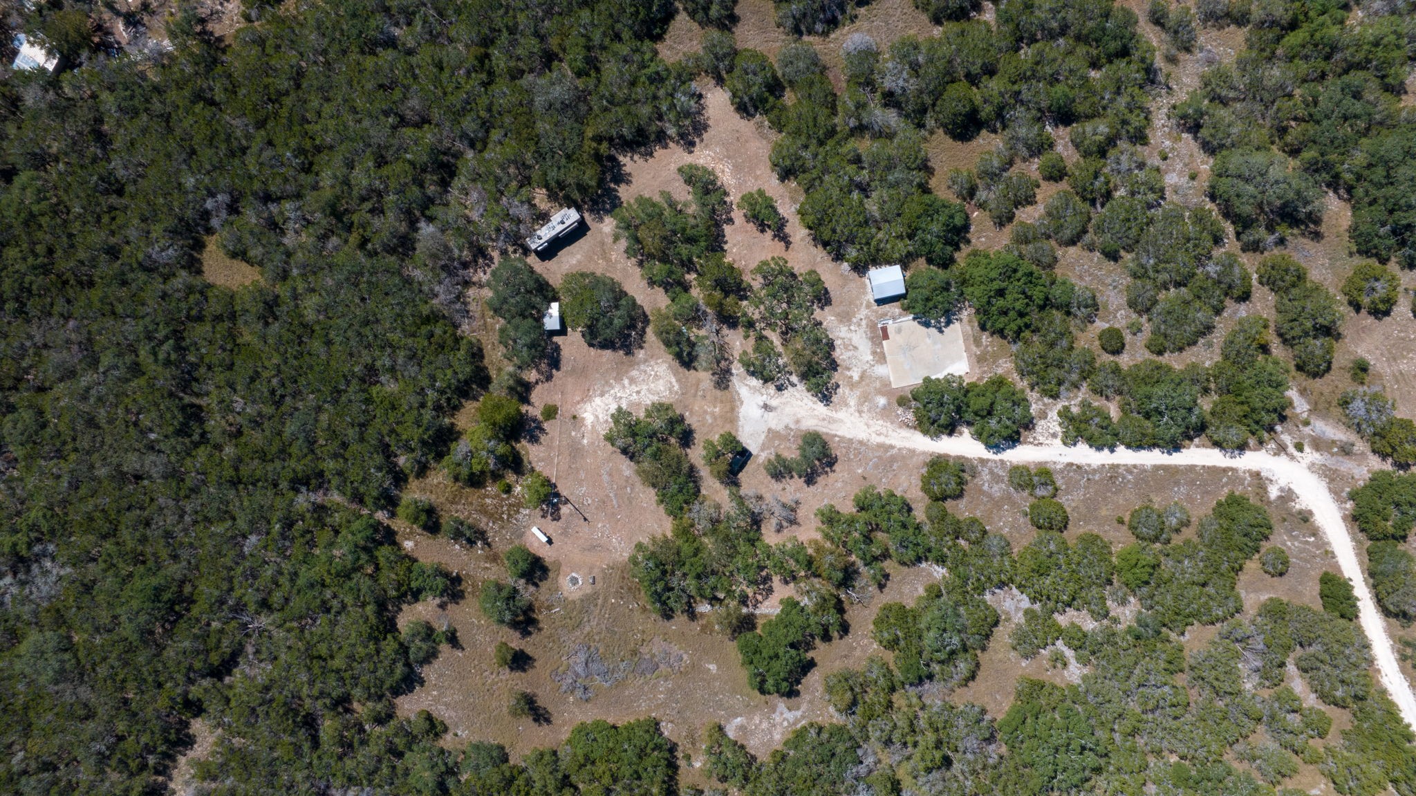 840 Forest View Drive Blanco, TX 78606 - Photo 20 of 32 an aerial view of residential house with outdoor space