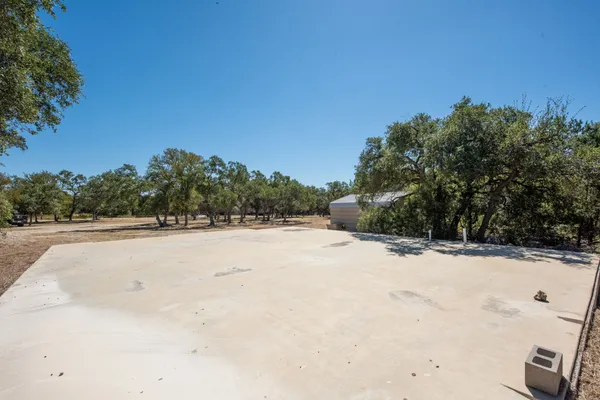 a view of swimming pool with a yard