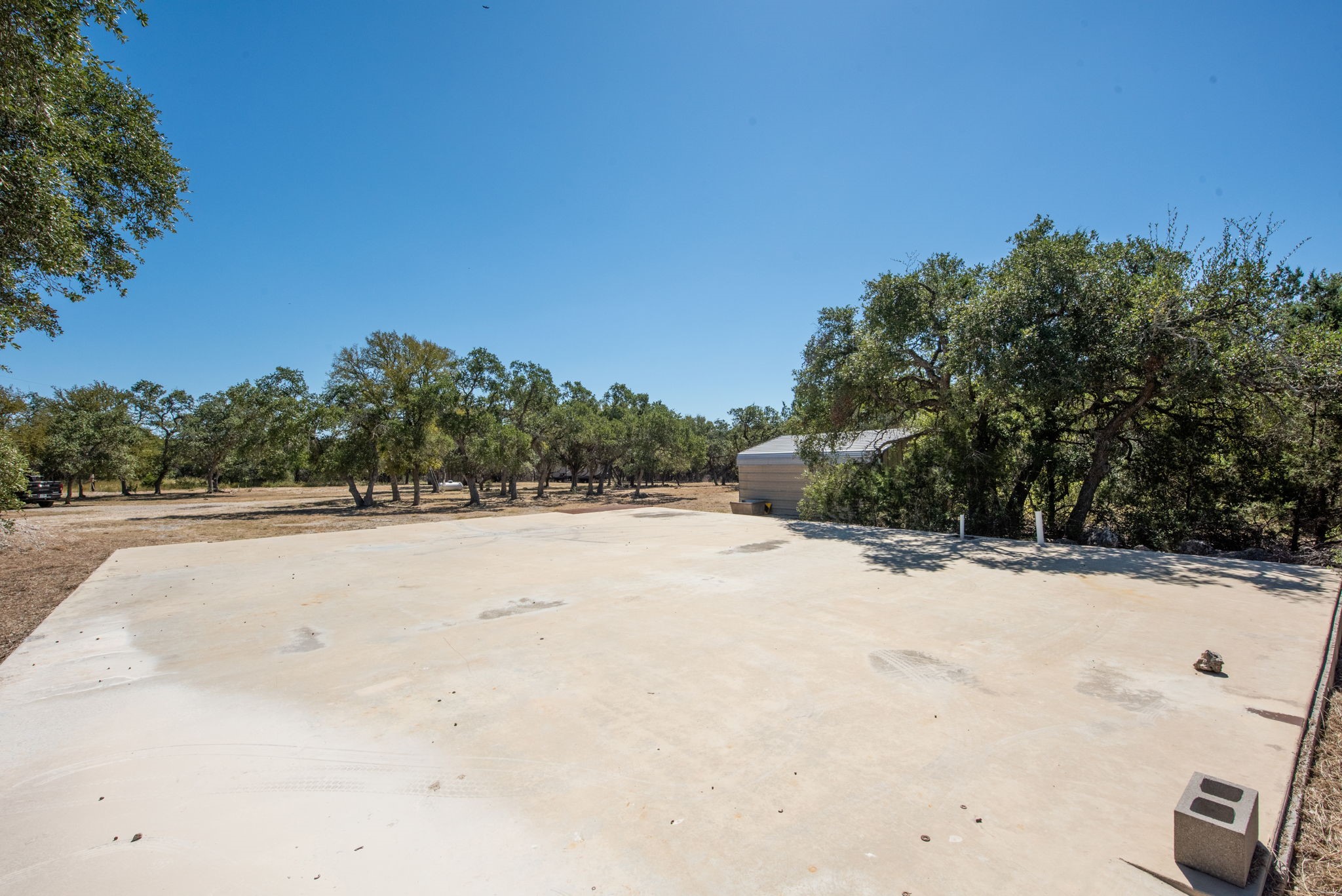 840 Forest View Drive Blanco, TX 78606 - Photo 22 of 32 a view of swimming pool with a yard