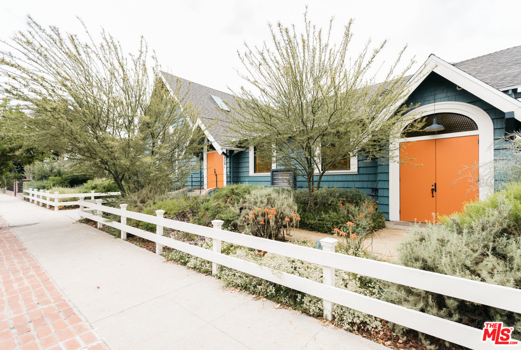 6408 Ruby Street Los Angeles, CA 90042 - Photo 2 of 36 a front view of a house with a yard