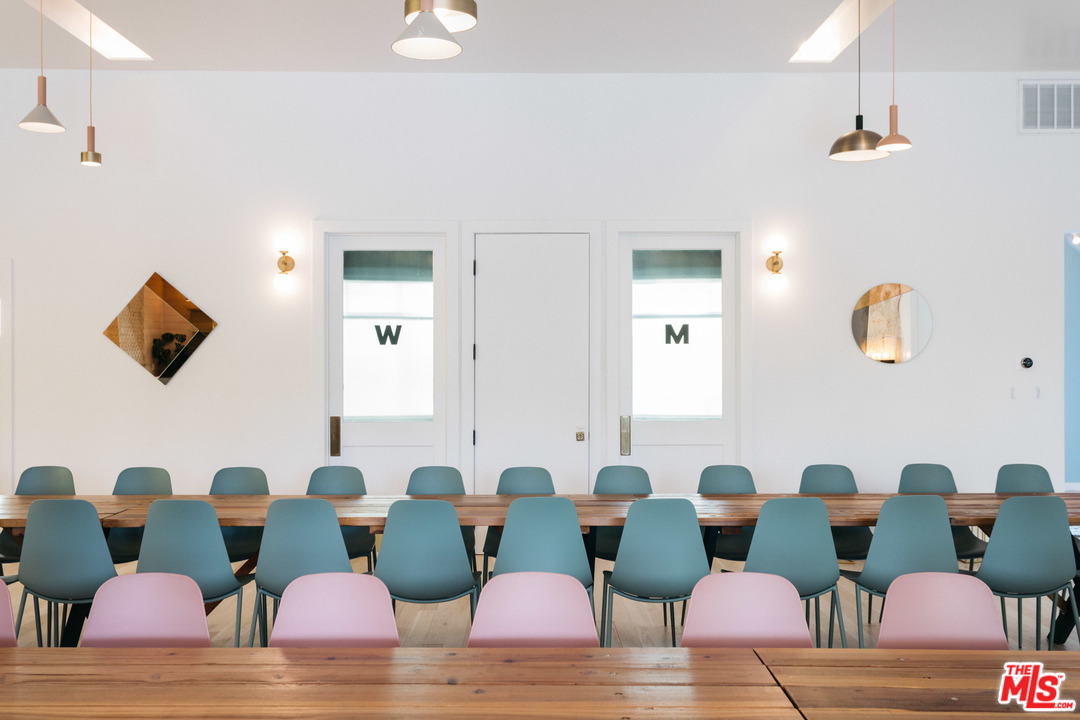 6408 Ruby Street Los Angeles, CA 90042 - Photo 14 of 36 a group of chairs sitting in a living room
