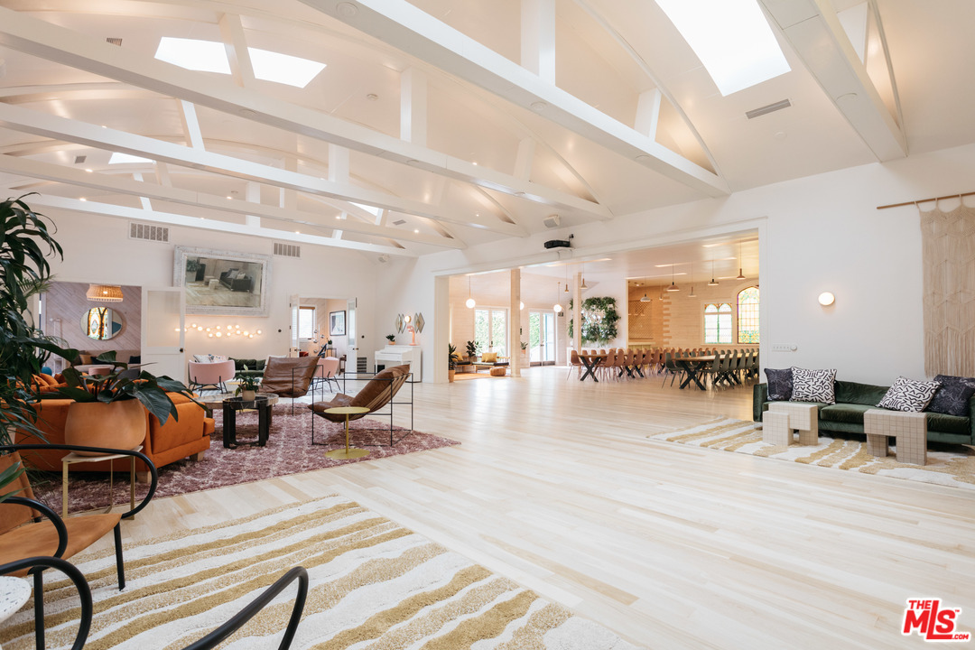 6408 Ruby Street Los Angeles, CA 90042 - Photo 24 of 36 a room with lots of chairs and mirrors