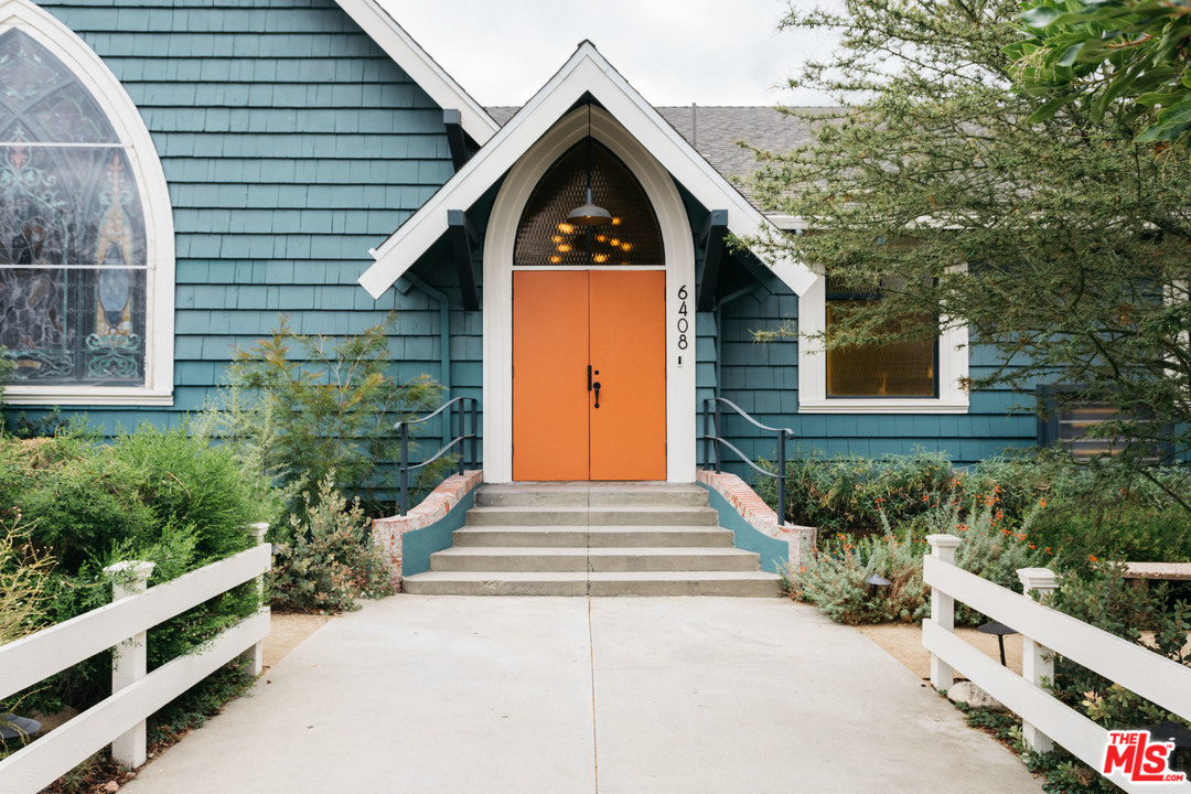 6408 Ruby Street Los Angeles, CA 90042 - Photo 4 of 36 a front view of a house with a yard