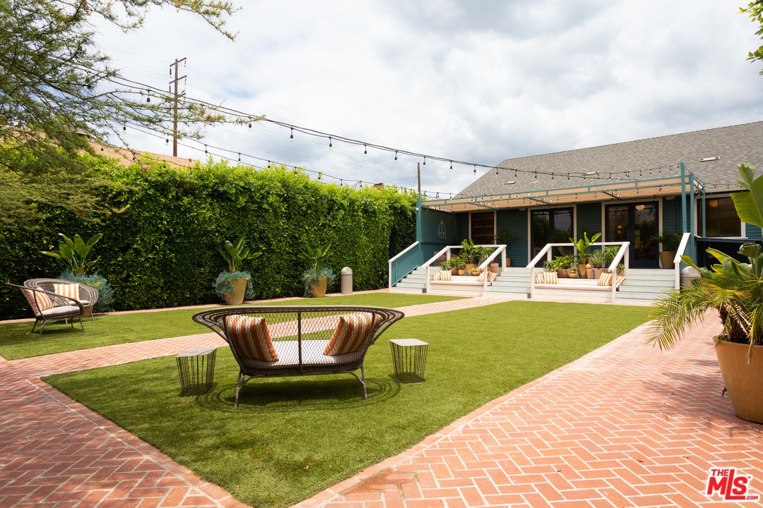 6408 Ruby Street Los Angeles, CA 90042 - Photo 31 of 36 a view of a swimming pool with a patio