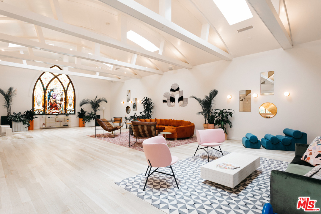 6408 Ruby Street Los Angeles, CA 90042 - Photo 8 of 36 a living room with furniture and a mirror