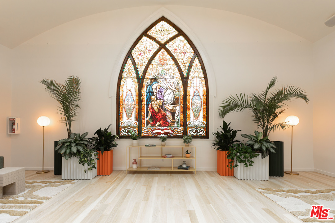 6408 Ruby Street Los Angeles, CA 90042 - Photo 9 of 36 a view of a room with a large window and potted plants