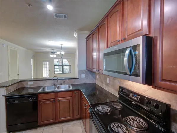 $165,000 | 904 Charo Parkway, Unit 514, Davenport, FL 33897