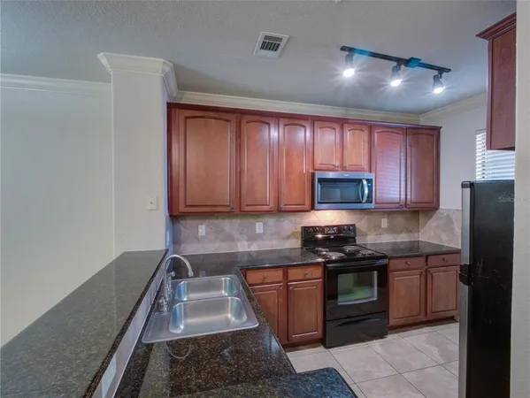 $165,000 | 904 Charo Parkway, Unit 514, Davenport, FL 33897