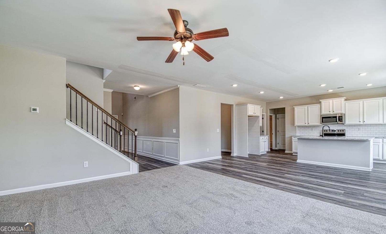 1172 Faulkner Way Jonesboro, GA 30238 - Photo 3 of 9 a view of a livingroom with a ceiling fan