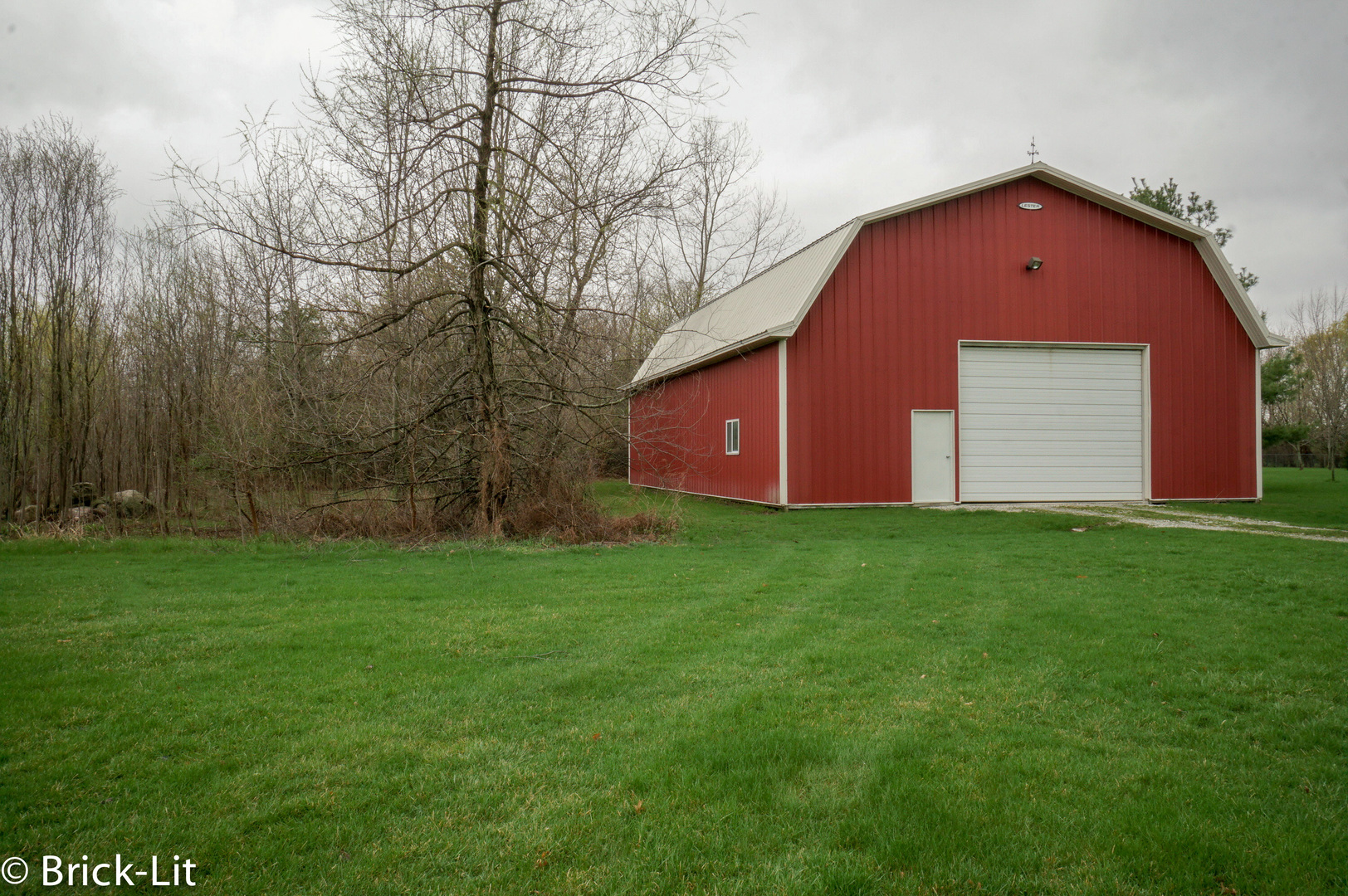 24102 South Schoolhouse Road Manhattan, IL 60442 - Photo 4 of 29 a front view of house with backyard and garden