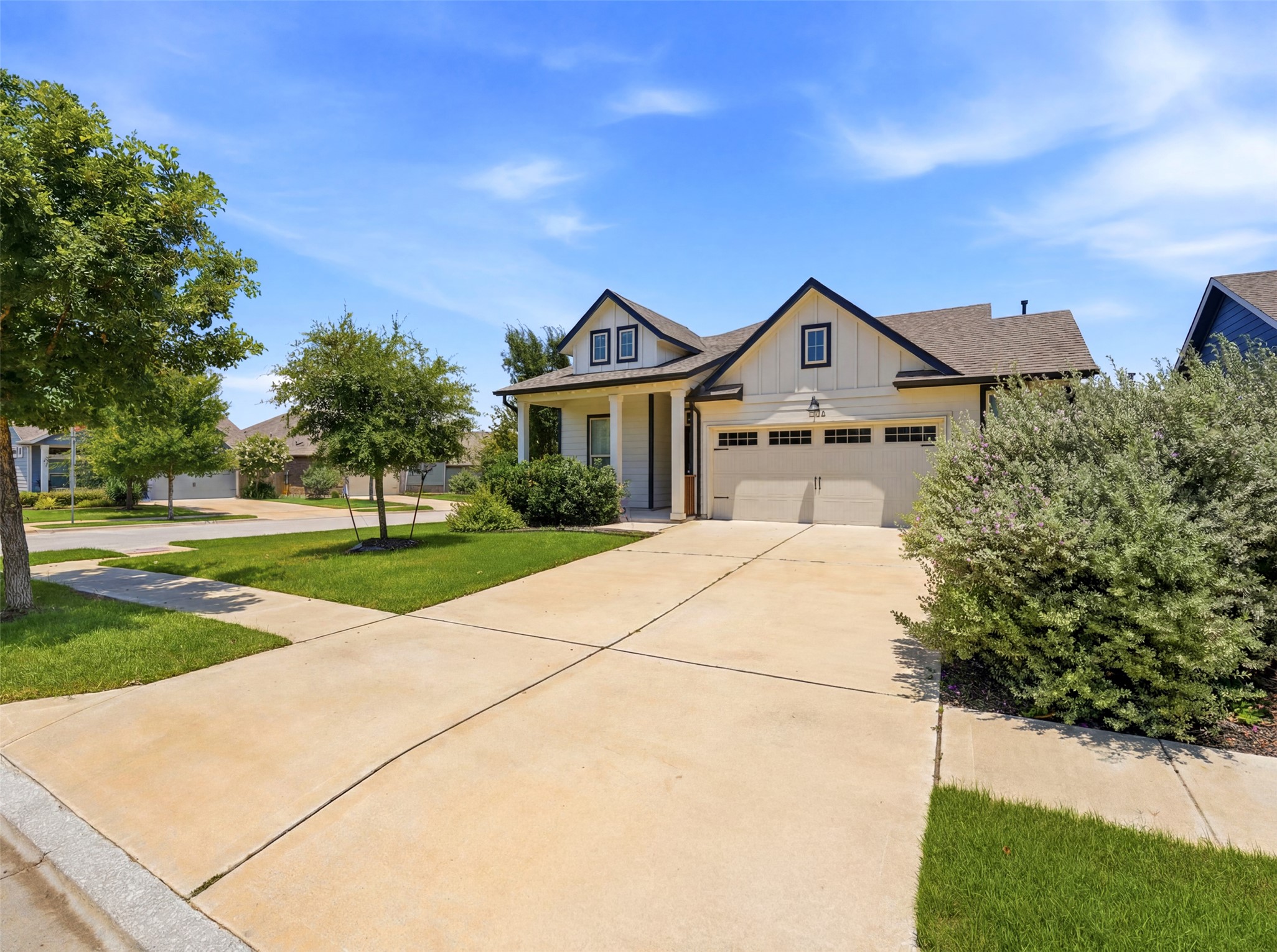 2132 Ringstaff Road Leander, TX 78641 - Photo 3 of 39 A classic facade with a welcoming covered entrance and neatly trimmed landscaping.