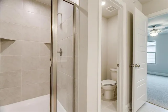 a bathroom with a double vanity sink mirror and double
