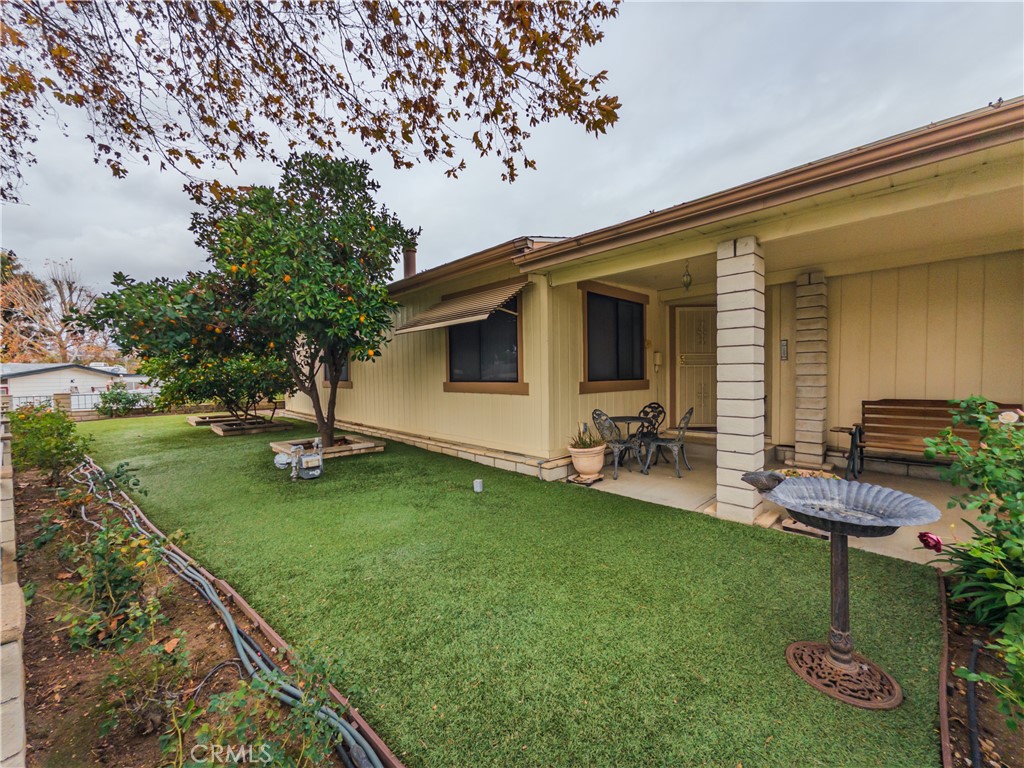 9465 Sharon Way Calimesa, CA 92320 - Photo 12 of 21 a backyard of a house with seating space