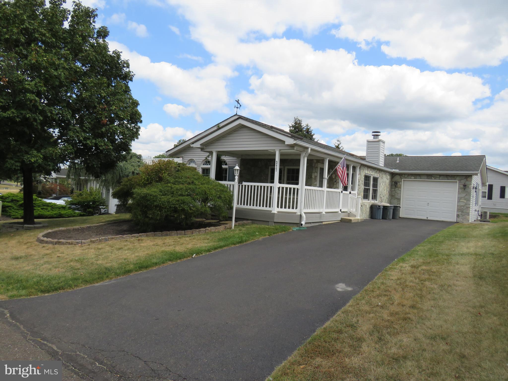 377 Spring Meadow Circle New Hope, PA 18938 - Photo 3 of 40 Enlarged front porch with skylights