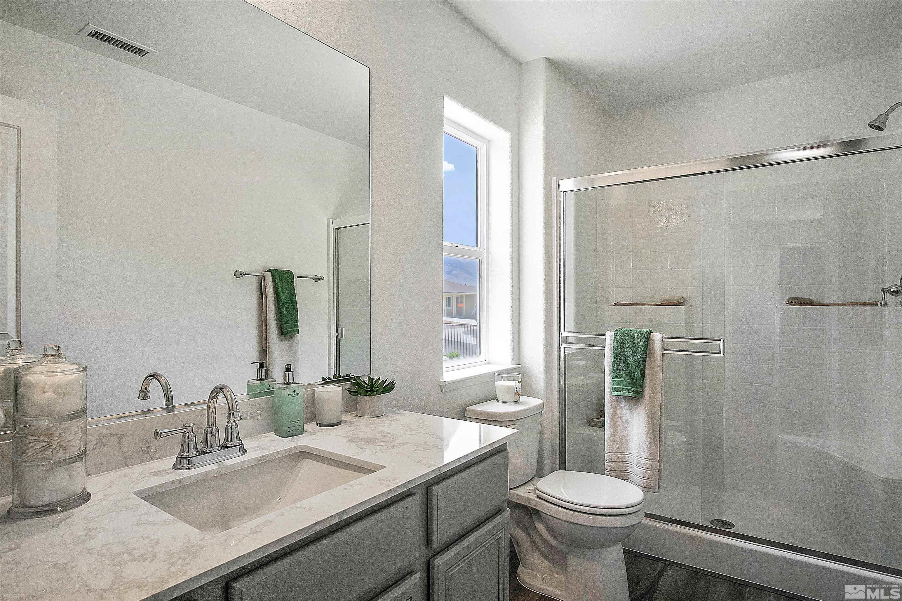 9320 Carter Reno, NV 89506 - Photo 4 of 7 a bathroom with a sink toilet and shower