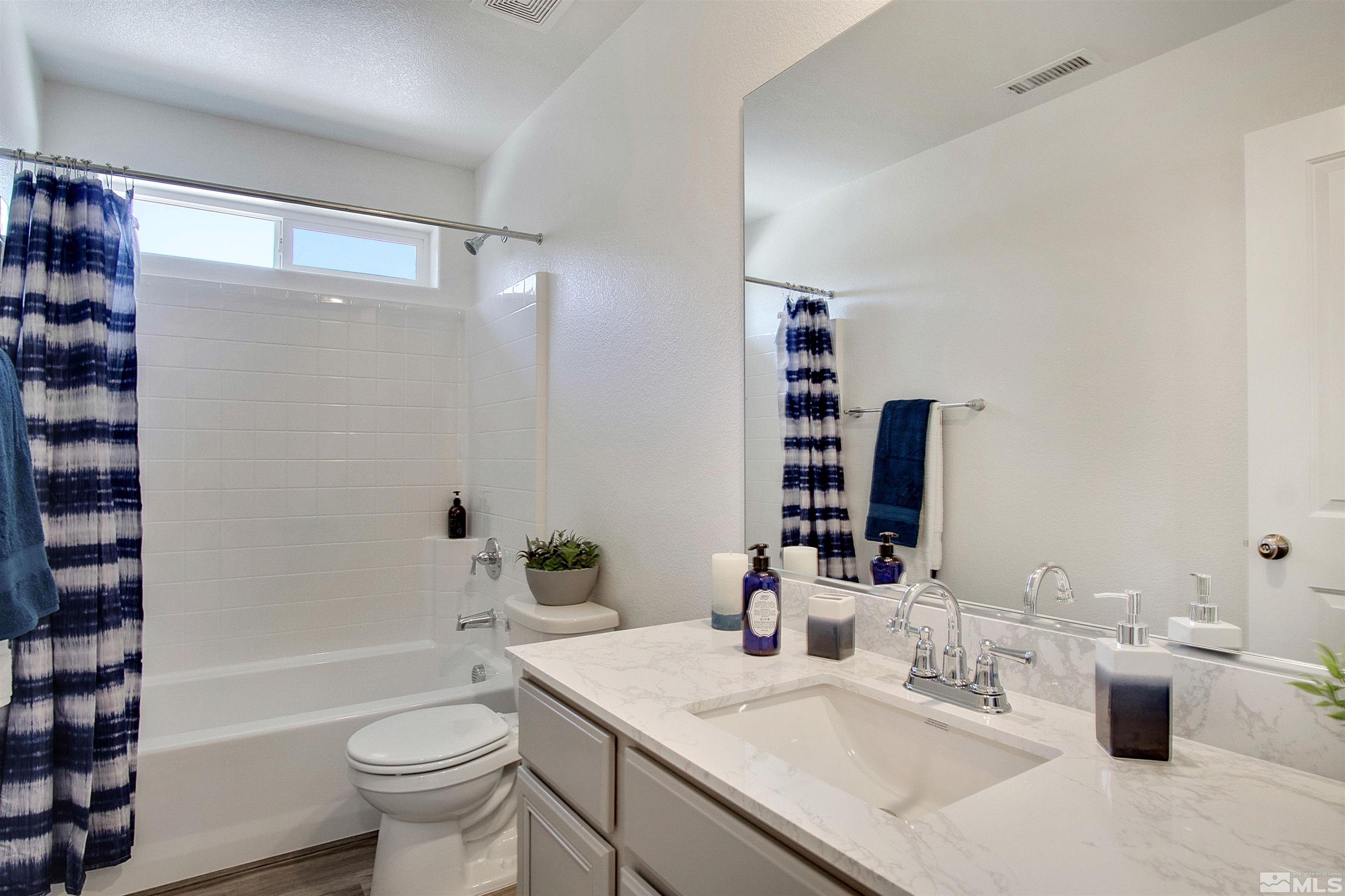 9320 Carter Reno, NV 89506 - Photo 7 of 7 a bathroom with a sink toilet tub and shower