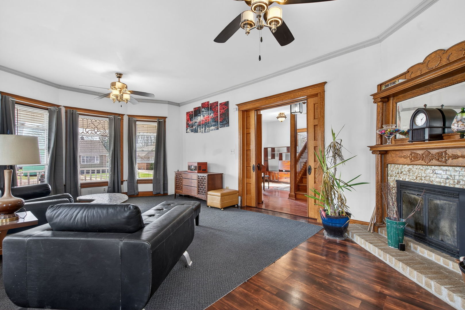 206 West Delaware Street Dwight, IL 60420 - Photo 11 of 42 a living room with furniture and a fireplace