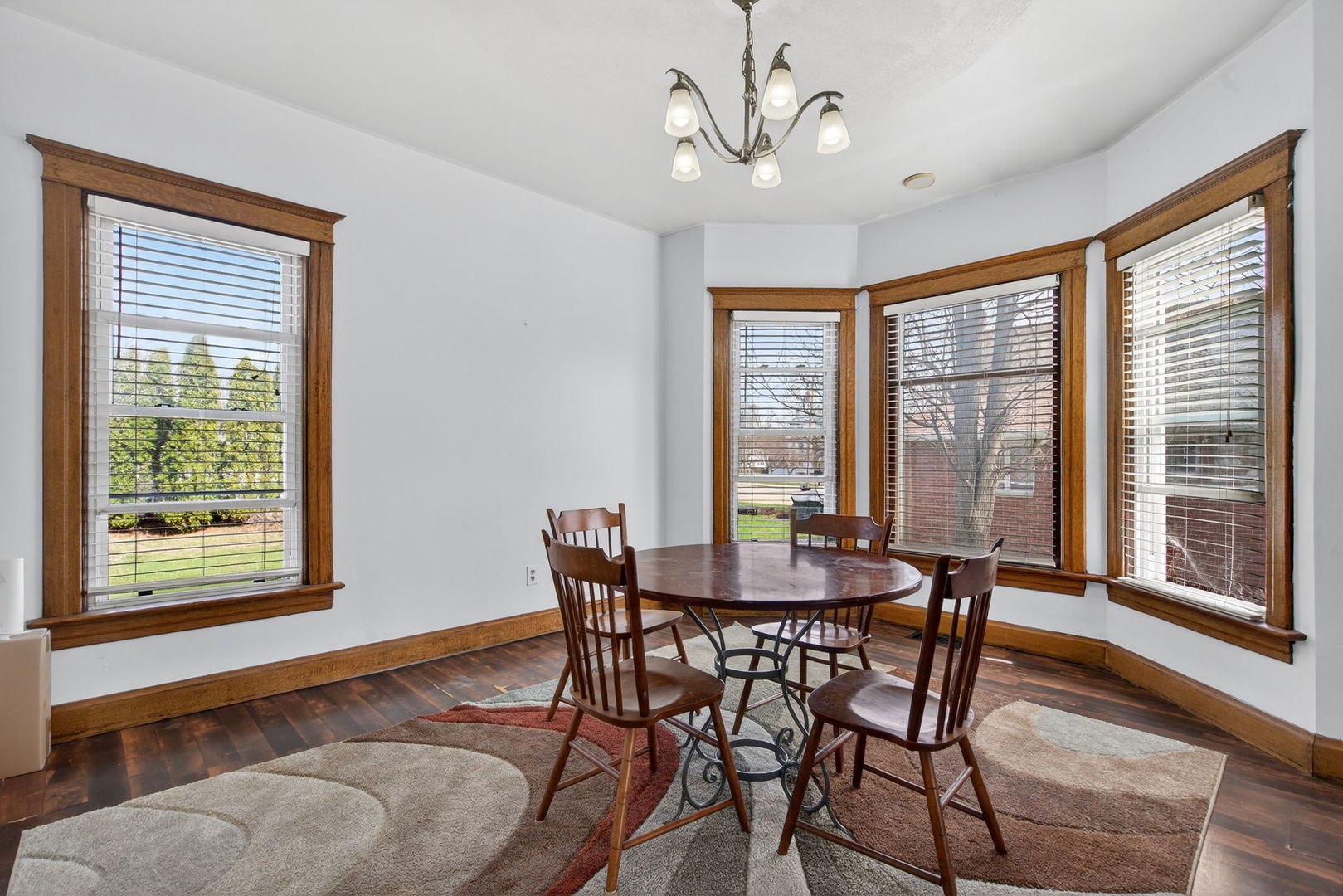 206 West Delaware Street Dwight, IL 60420 - Photo 13 of 42 a view of a dining room with furniture window and wooden floor