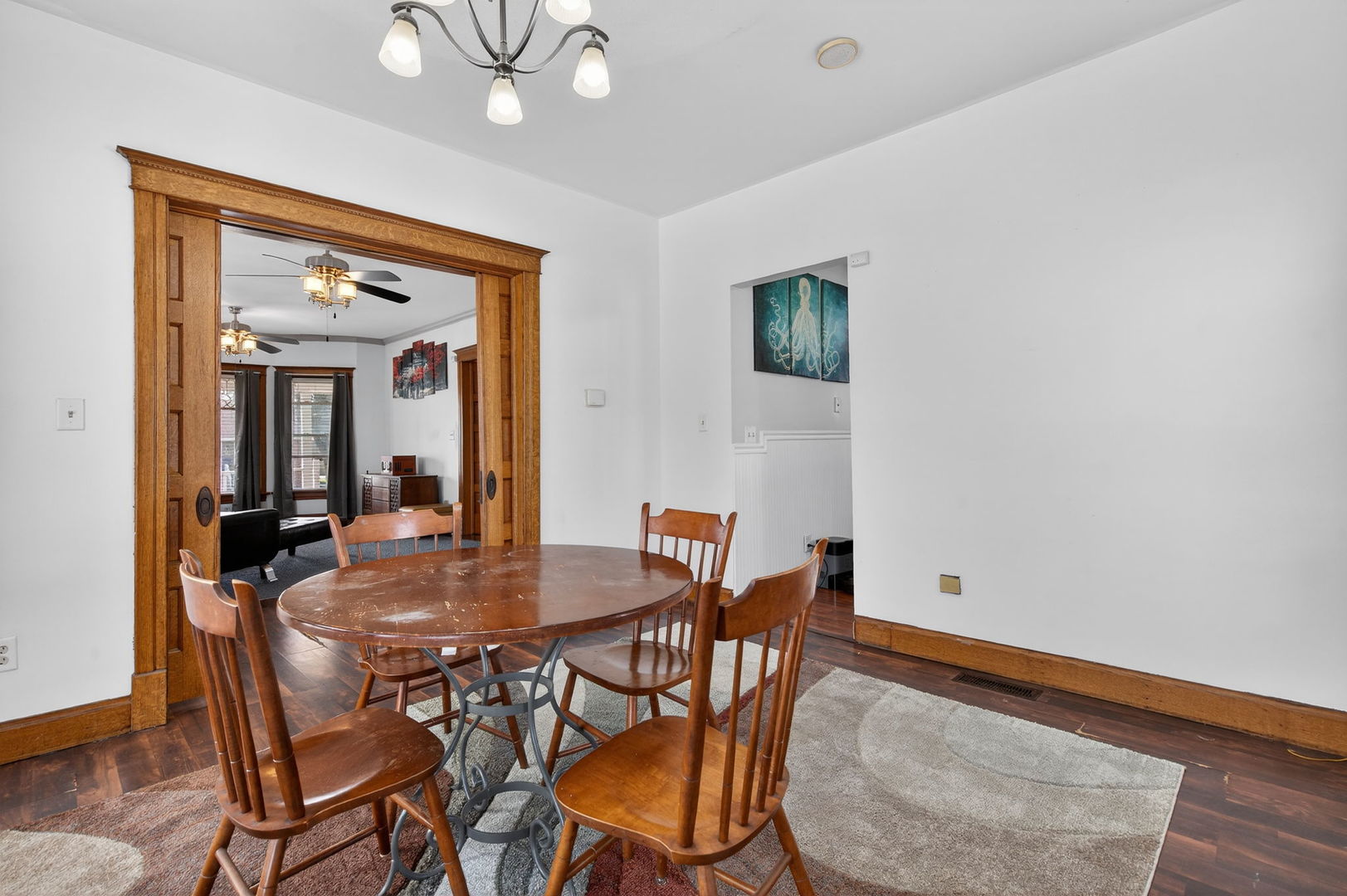 206 West Delaware Street Dwight, IL 60420 - Photo 15 of 42 a view of a dining room with furniture and wooden floor
