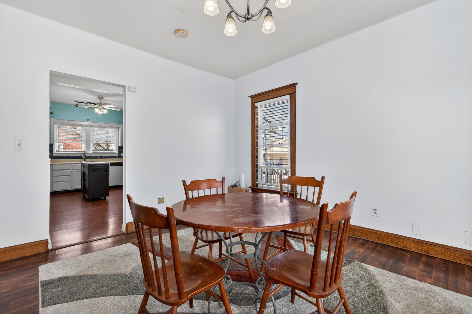 206 West Delaware Street Dwight, IL 60420 - Photo 16 of 42 a view of a dining room with furniture and wooden floor