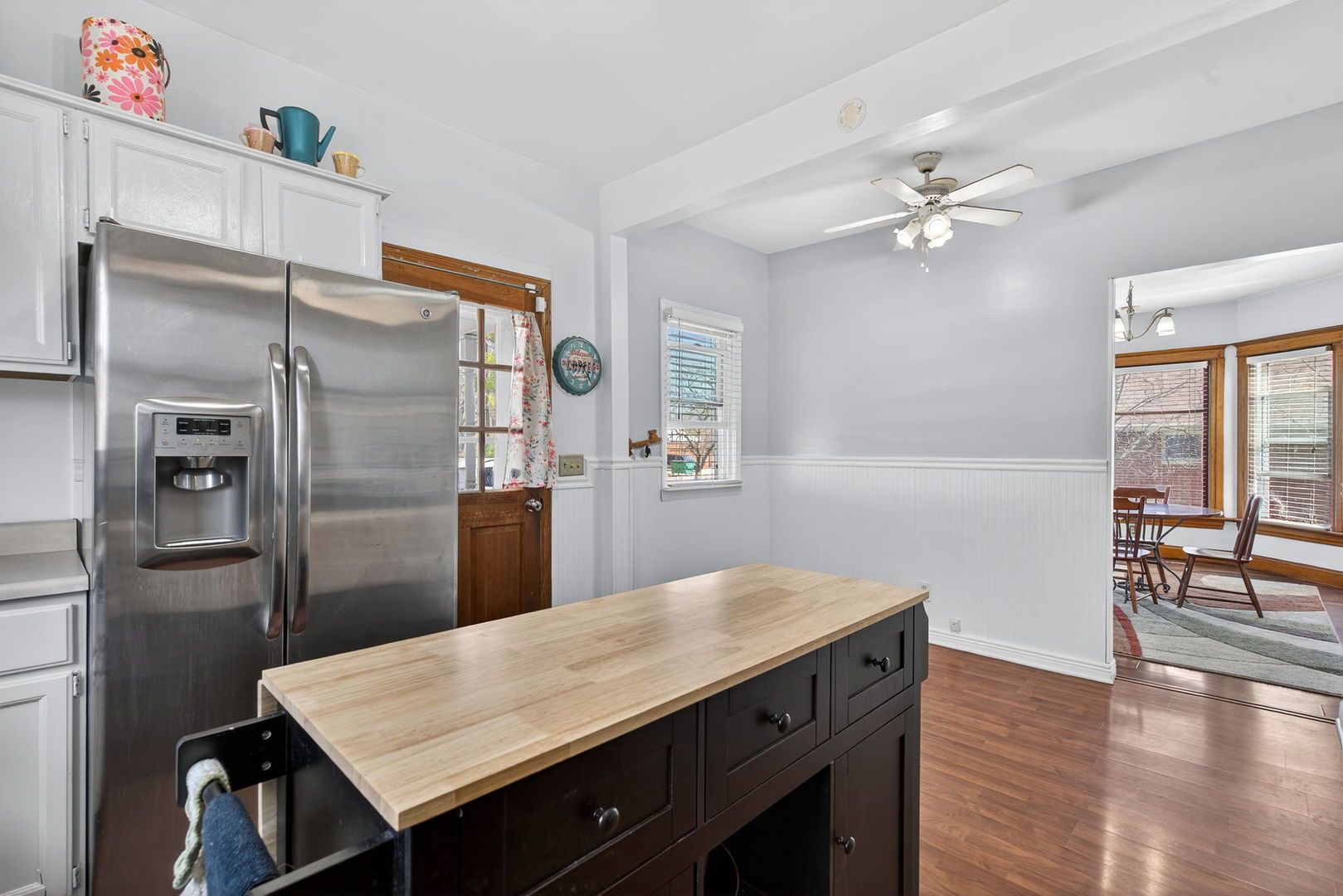 206 West Delaware Street Dwight, IL 60420 - Photo 18 of 42 a kitchen with a table and refrigerator