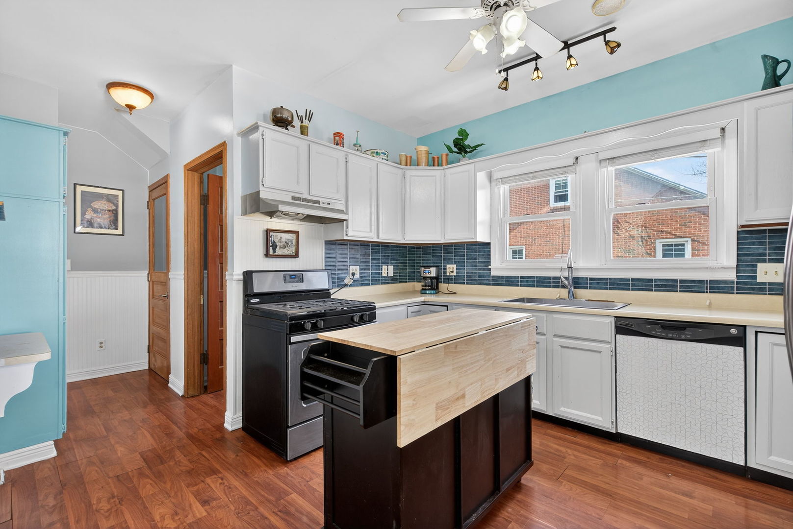 206 West Delaware Street Dwight, IL 60420 - Photo 21 of 42 a kitchen with stainless steel appliances granite countertop a sink stove and refrigerator