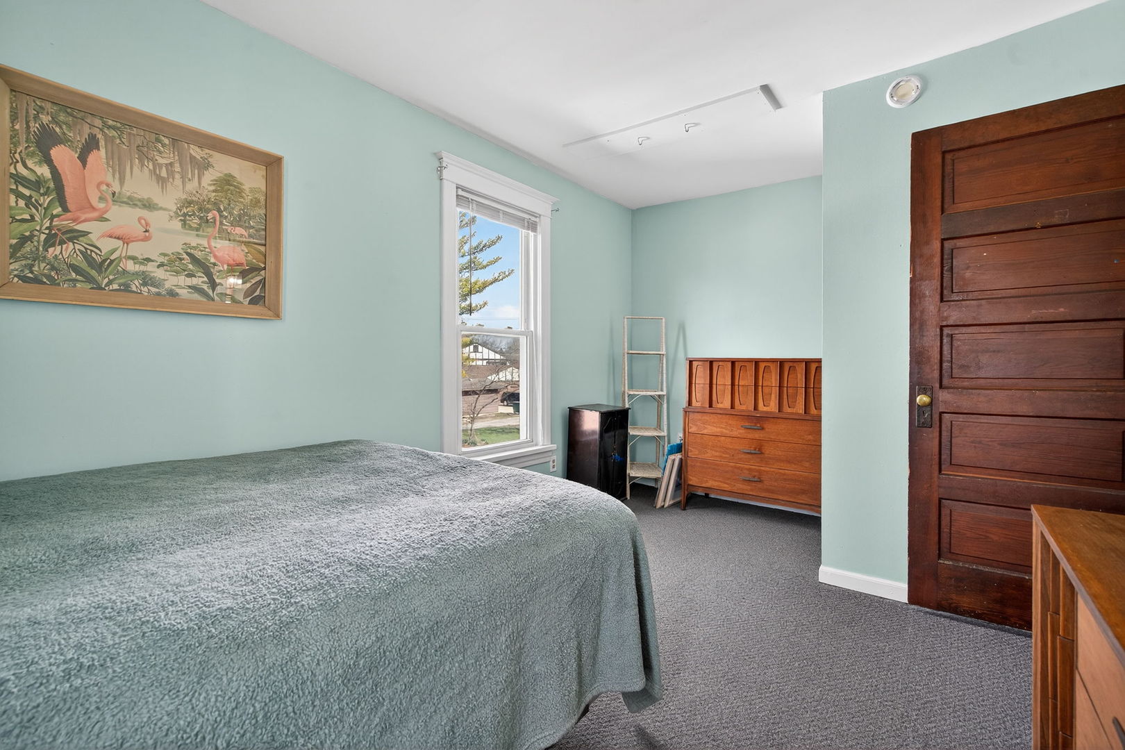 206 West Delaware Street Dwight, IL 60420 - Photo 24 of 42 a bedroom with a bed and a window