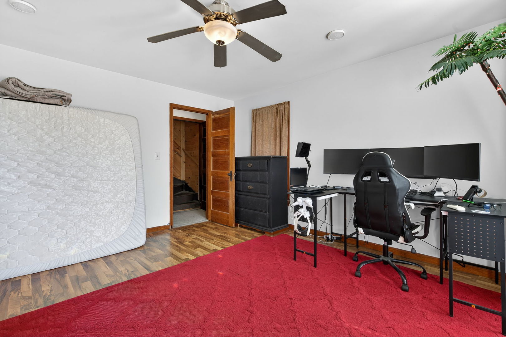 206 West Delaware Street Dwight, IL 60420 - Photo 34 of 42 a view of a workspace with furniture and gym equipment