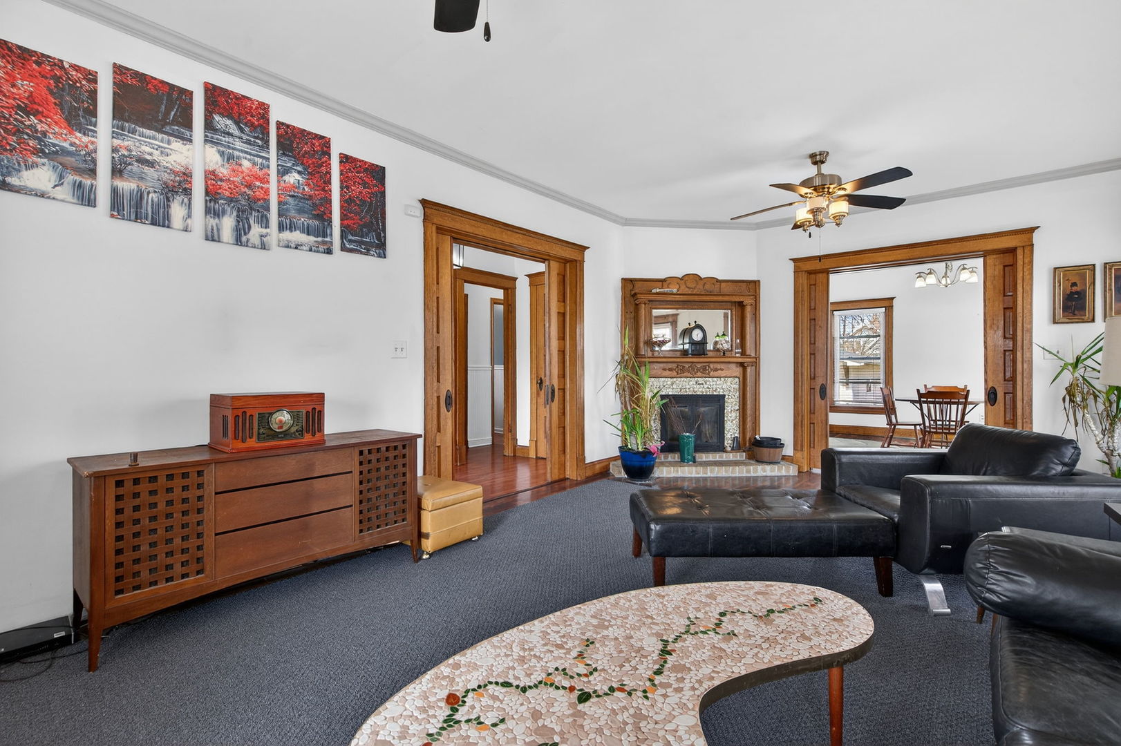 206 West Delaware Street Dwight, IL 60420 - Photo 8 of 42 a living room with furniture fireplace and a large window
