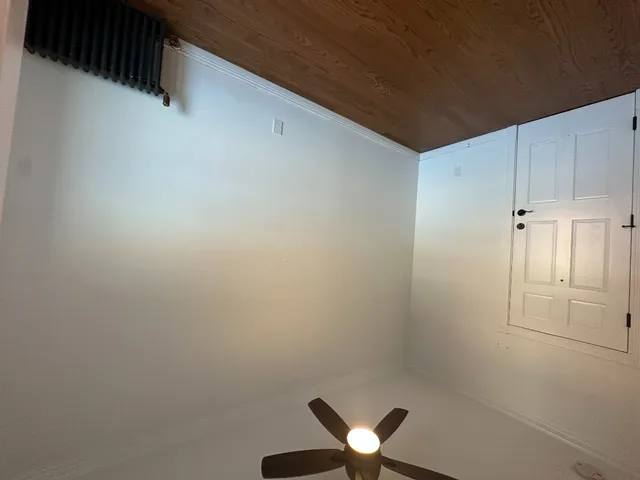 a view of a hallway with closet