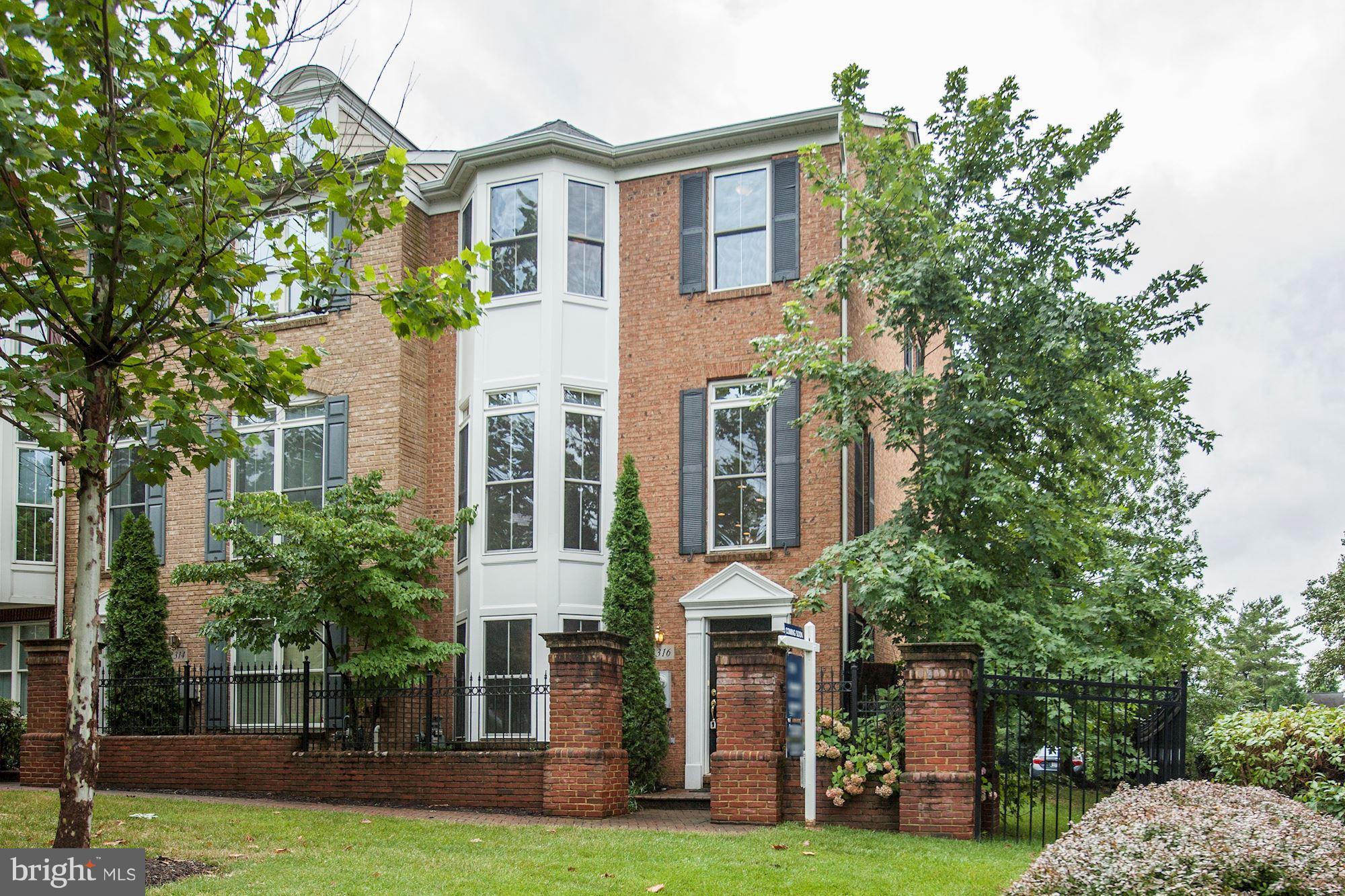 2316 Plyers Mill Road Silver Spring, MD 20902 - Photo 1 of 24 a front view of a building with garden