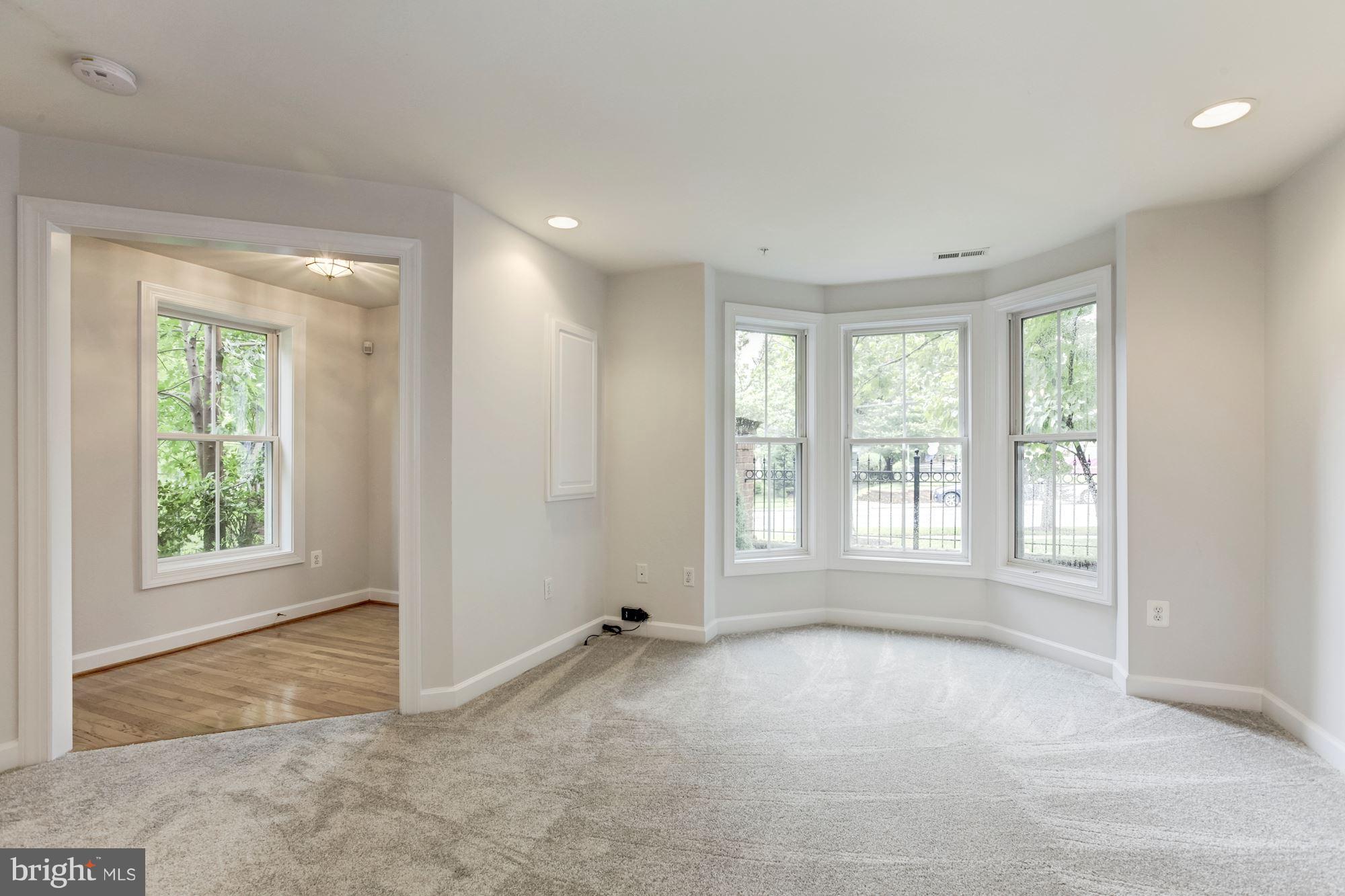 2316 Plyers Mill Road Silver Spring, MD 20902 - Photo 2 of 24 a view of an empty room with a window