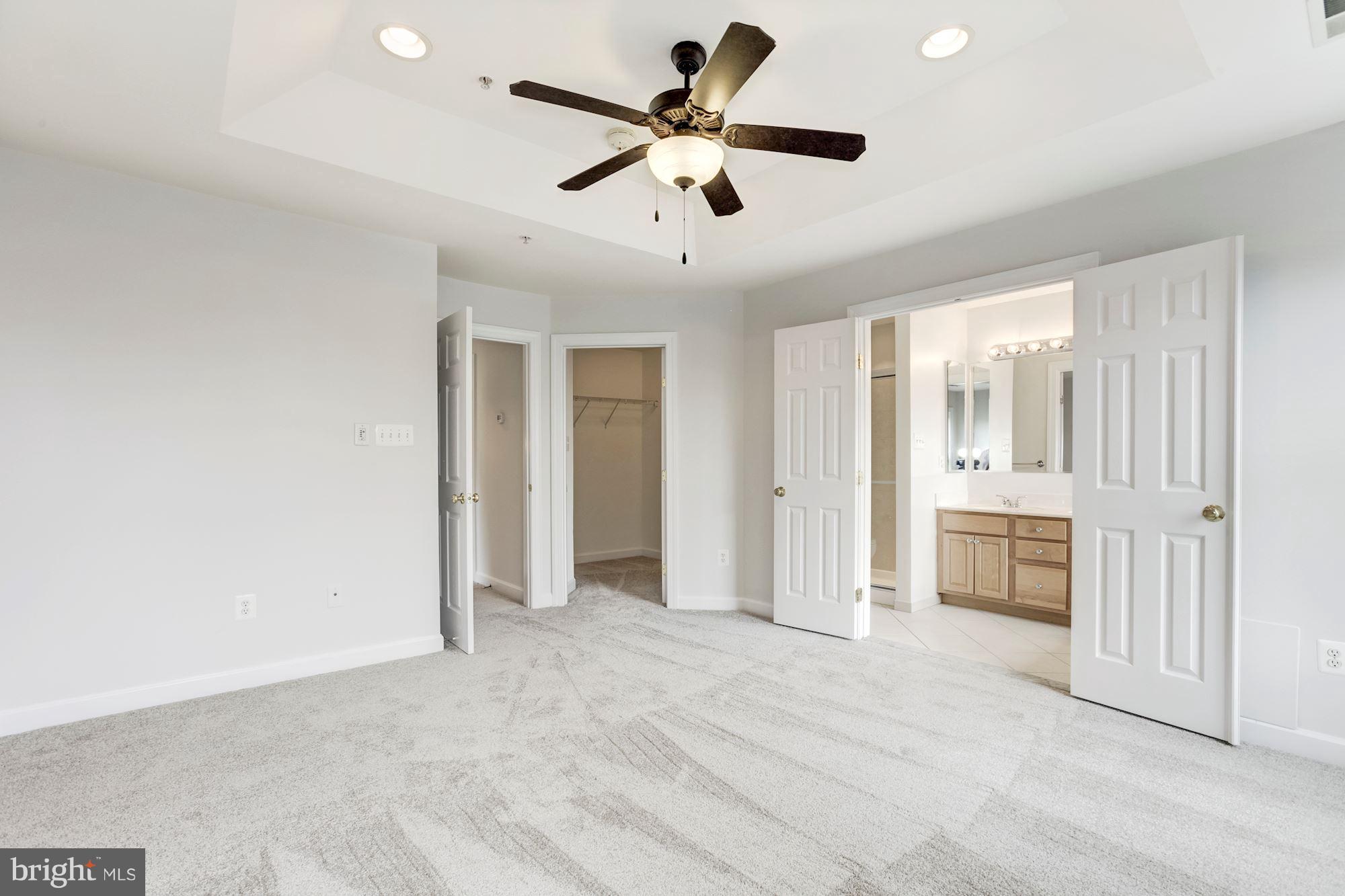 2316 Plyers Mill Road Silver Spring, MD 20902 - Photo 16 of 24 a view of an empty room with a ceiling fan