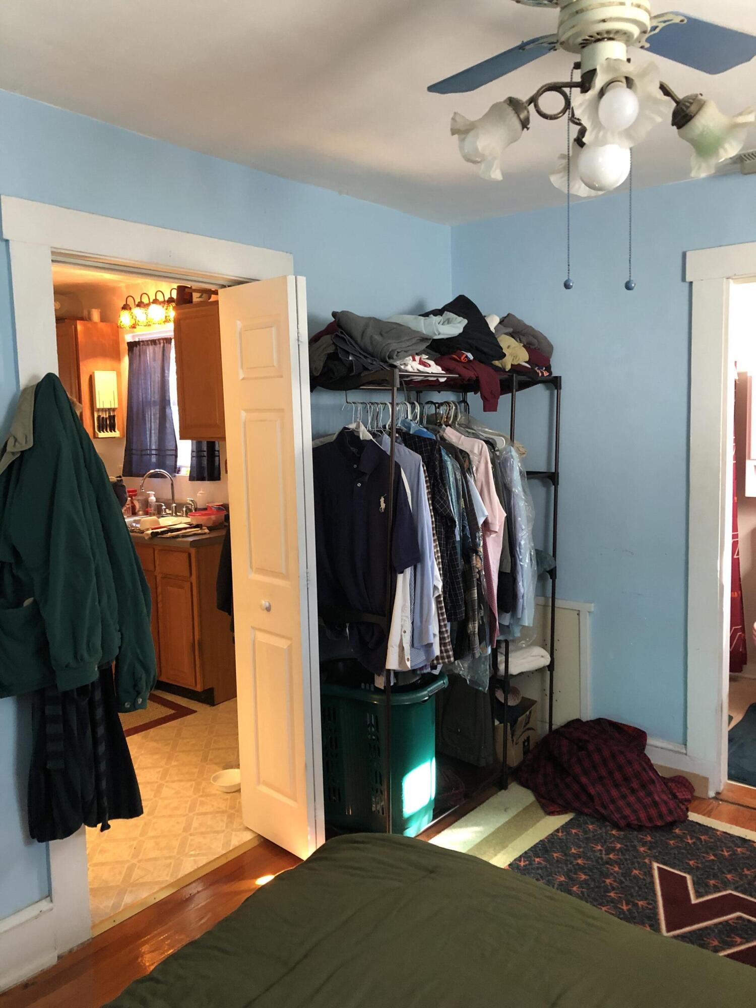 3716 Ventnor Road Southeast Roanoke, VA 24014 - Photo 14 of 26 a view of walk in closet with clothes and shoes