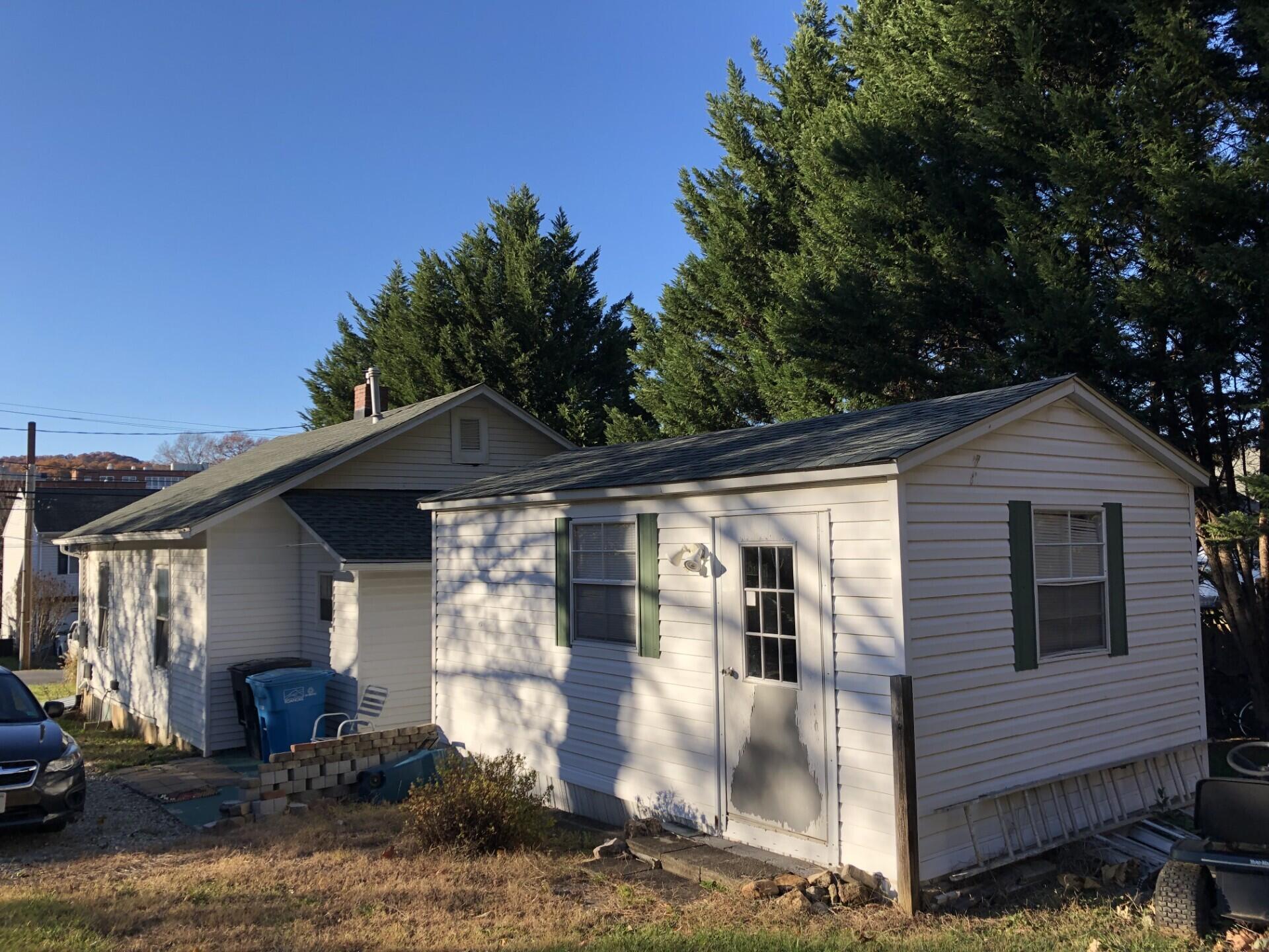 3716 Ventnor Road Southeast Roanoke, VA 24014 - Photo 16 of 26 a front view of a house with garden