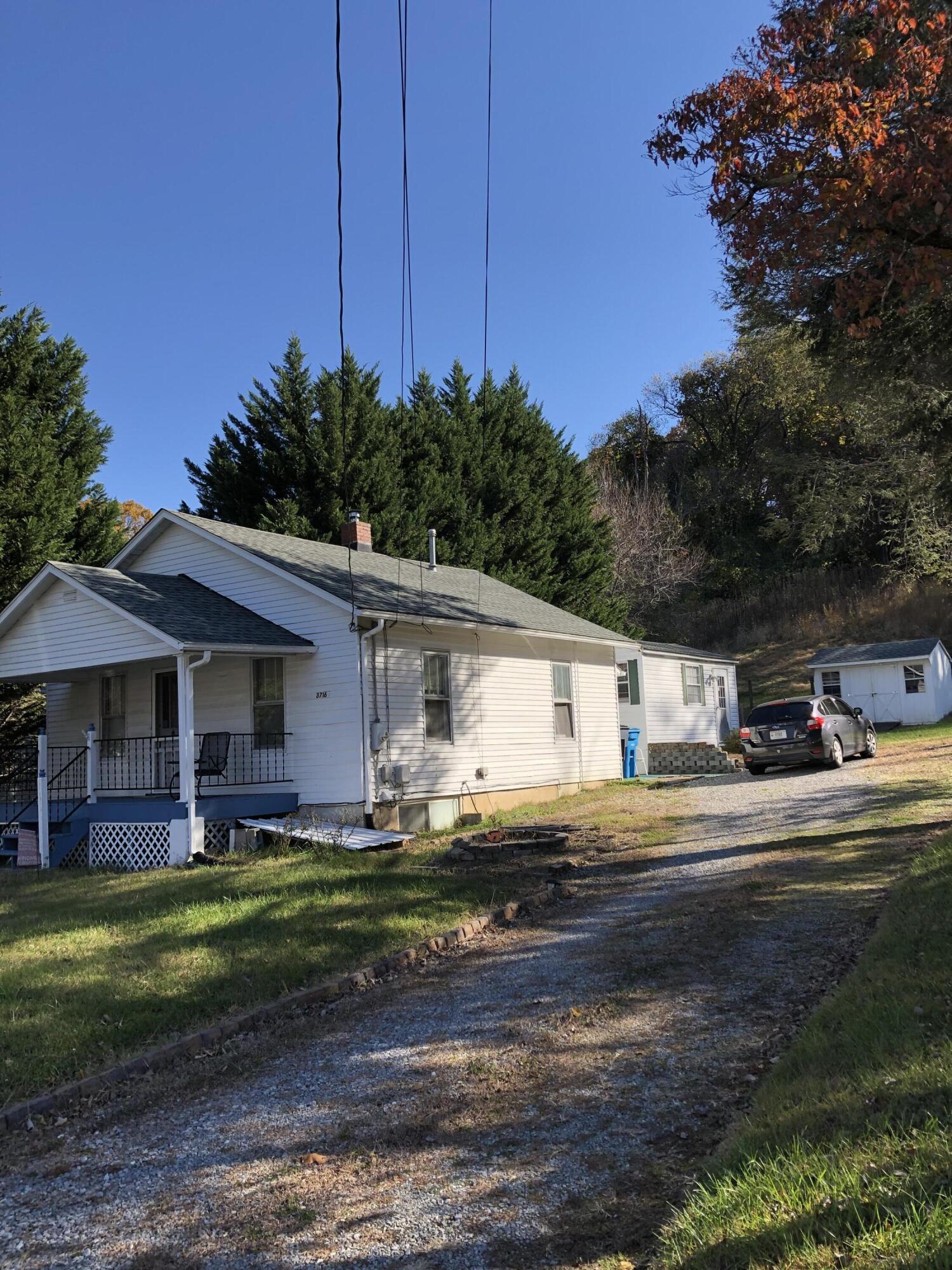 3716 Ventnor Road Southeast Roanoke, VA 24014 - Photo 17 of 26 a front view of a house with a yard