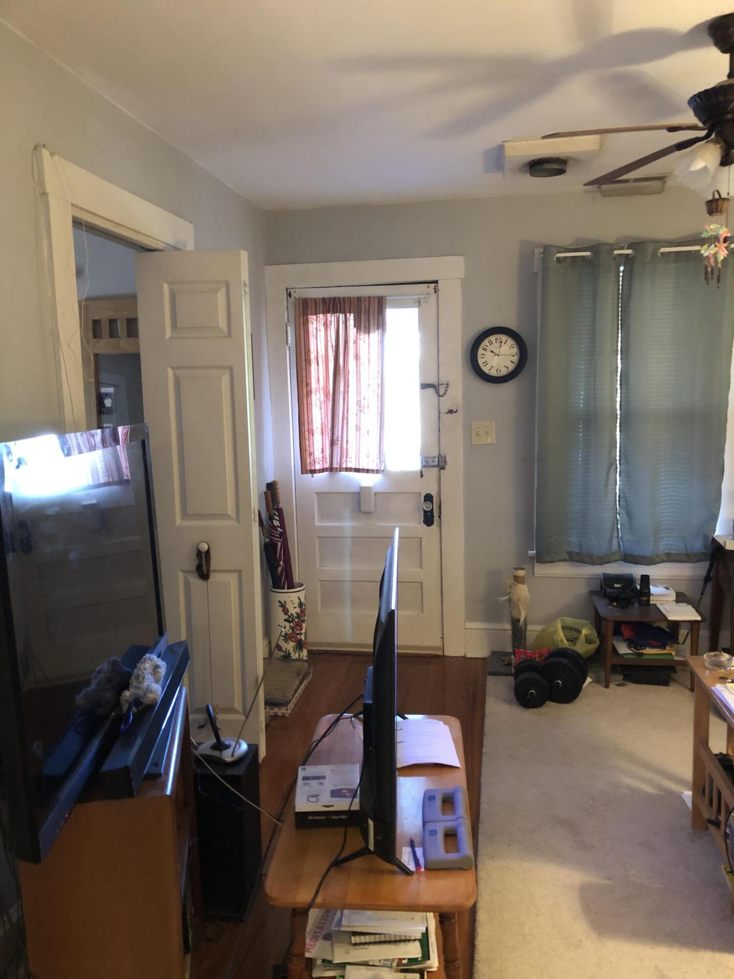 3716 Ventnor Road Southeast Roanoke, VA 24014 - Photo 6 of 26 a view of a workspace with furniture and a window