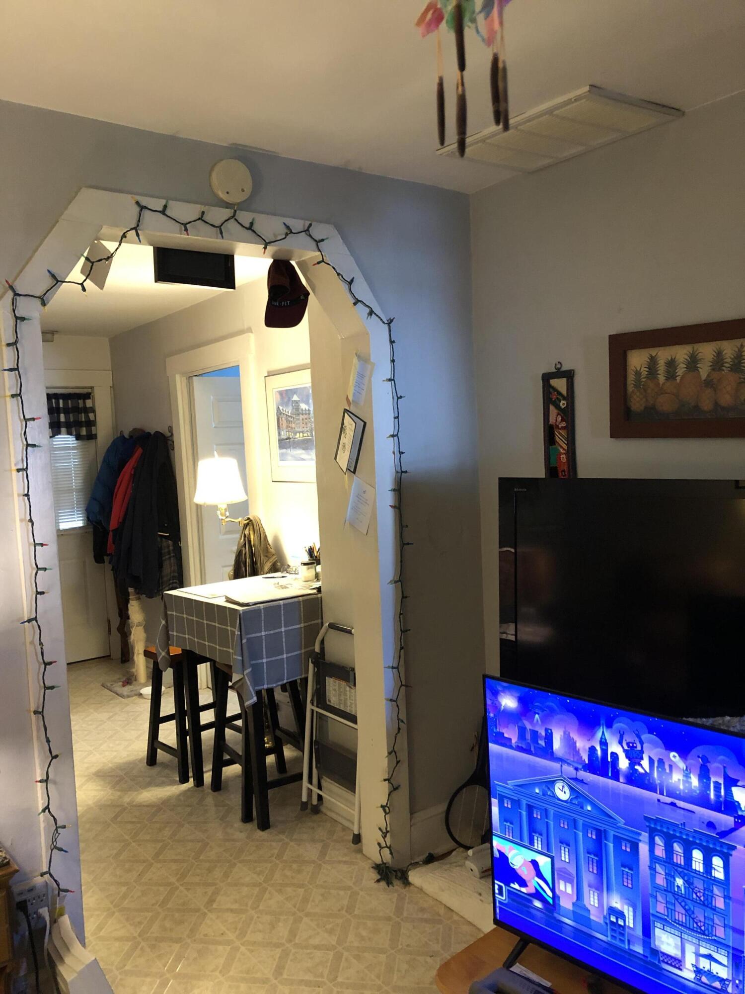 3716 Ventnor Road Southeast Roanoke, VA 24014 - Photo 7 of 26 a dining room with furniture and a flat screen tv
