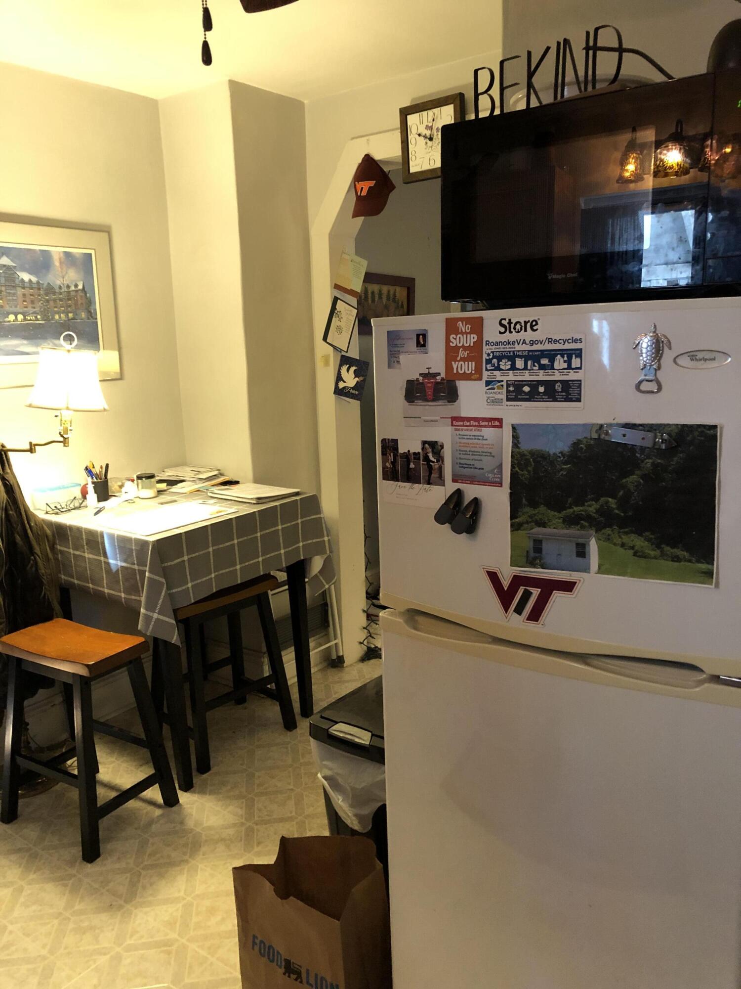 3716 Ventnor Road Southeast Roanoke, VA 24014 - Photo 10 of 26 a view of a living room with furniture and a flat screen tv