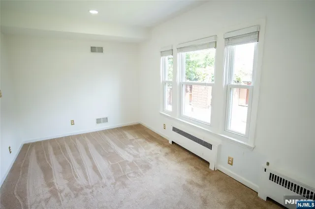 a view of a window in an empty room