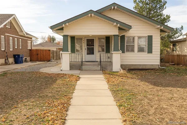 a front view of a house with a porch