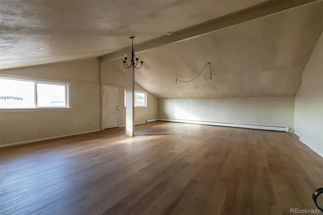 a view of a big room with wooden floor