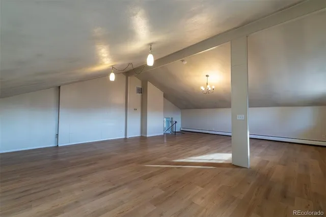 a view of room with wooden walls