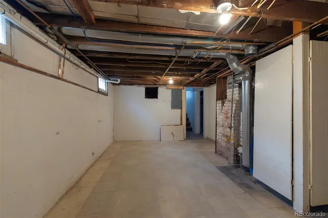 a view of a room with wooden walls